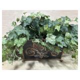 Artificial ivy plant in metal pot
