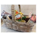 Basket of Fall decorations and bird houses