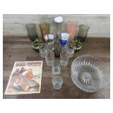 Box with old juice glasses. serving bowl and