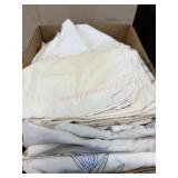 Box lot of embroidery pillow cases and linens