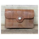 Leather pouch with 30-06 rounds. Corroded