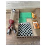 Case lube pad. Primer tray. Case holder. Sizing