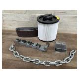 Flat with shop vac filter, sanding belts, chain