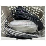 Basket of hose, door closer, misc, items