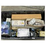 Tote of various light bulbs and solar light