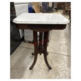Antique Victorian parlor table with  marble top