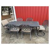 Right iron patio table and six chairs.  Two