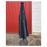 Rod iron umbrella stand with umbrella