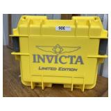 Yellow Invicta watch case with Liquor decanter