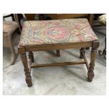 Old vanity stool with printed fabric