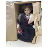 Yesterdays Child Boyds bear porcelain doll in red