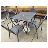 4 top rod iron patio table with an umbrella stand