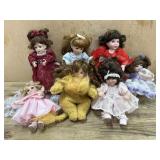 7- Marie Osmond porcelain cupcake dolls in pink,