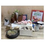 Box lot with metal can of rocks, Linens and misc