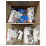 Box of plumbing supplies and apparatus
