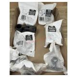 Box of various plumbing supplies