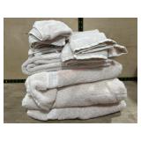 4 Tan bath towels , 2 hand towels and 8 wash rags