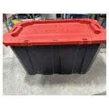 Black tote with red lid