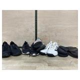Box of mens tennis shoes and slides size 10