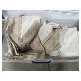 Tote with lid full of curtains