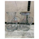 2- Glass pitchers with one wood lid