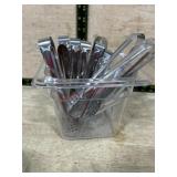 Tray of small serving tongs