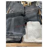 Box lot of tan and black hand towels and wash