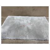 Tan bath mat 20x30