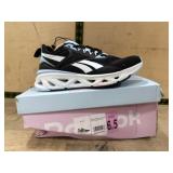 Women's Black and White Reebok Soleus Run Sneakers