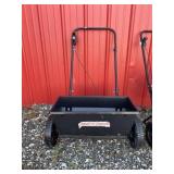 Red devil seed spreader