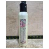 Davines Haircare Bottle with Floral Labeling