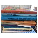 Stack of hard back collectors guide books