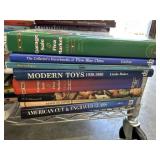 Stack of hard back collectors guide books  Garage