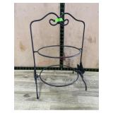 Decorative wrought iron plate stand