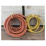Orange 25 foot extension cord in a yellow 10 foot