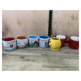 Flat of 4 starbucks mugs and 3 coffee mugs