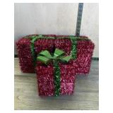 3- Red outdoor Christmas packages