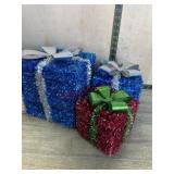 Set of blue tinsel decoration Christmas packages