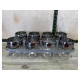 Mid Century Modern metal silver caddy with 8 roly