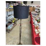 Floor lamp with black shade