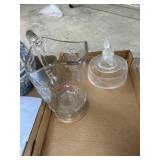 Flat with press glass pitcher and butter dish top
