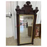 58x24 Carved dark wood framed mirror