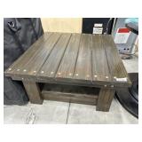 Wooden coffee table- has scratches