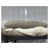 2 outdoor cushions- ripped fabric