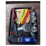 Tray of shot measures. Knifes. Juicer. Corkscrew.