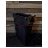Black plastic rectangular trash can