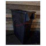 Black plastic rectangular trash can