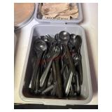 Small bus tubs with serving spoons