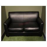 Black leather love seat like new