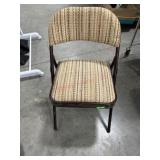 Brown padded folding chair